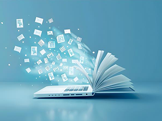 laptop with book pages coming out back and icons flying out of screen