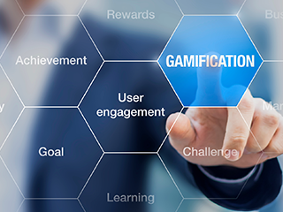 person in business suit in background touching gamification image in foreground