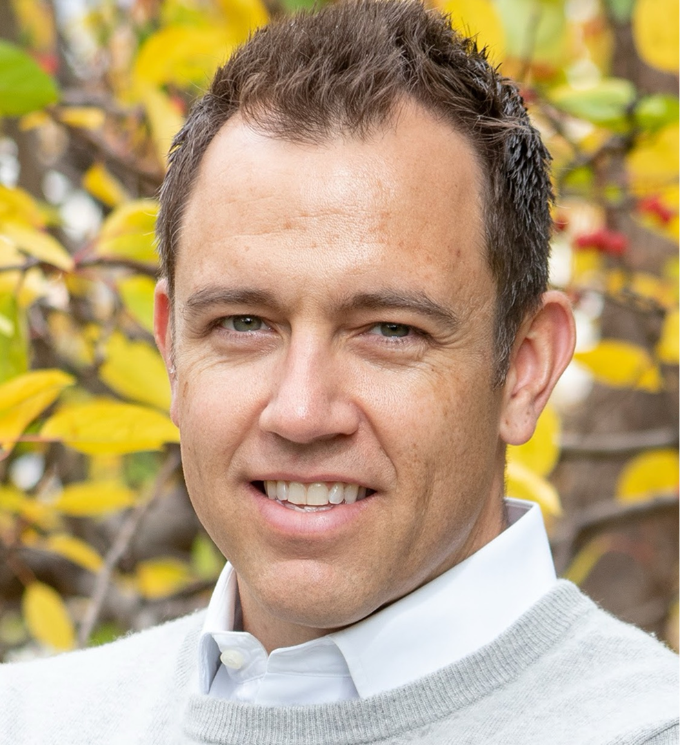 professional shot of Steve in front of tree